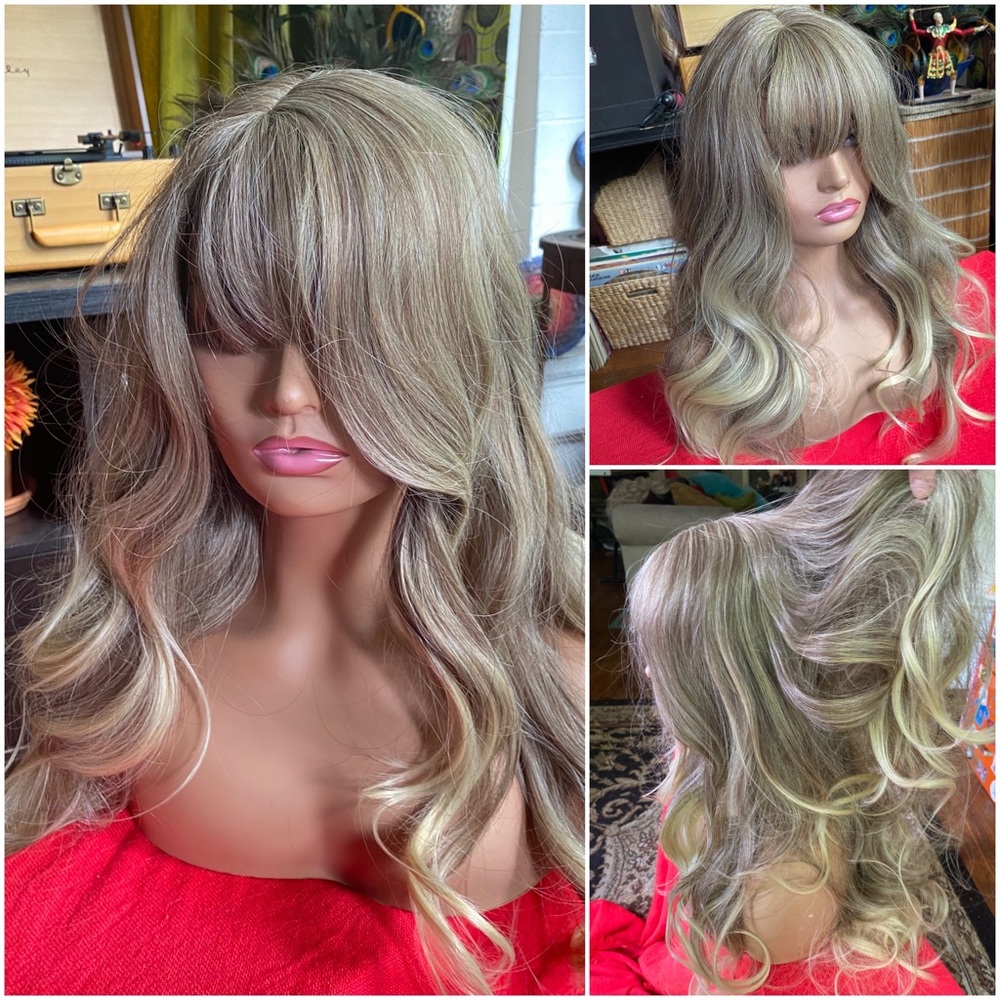 Ash blonde balayage with bangs